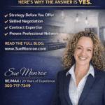 Smiling female real estate agent in kitchen