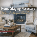 Staged living room with fireplace and coffee table